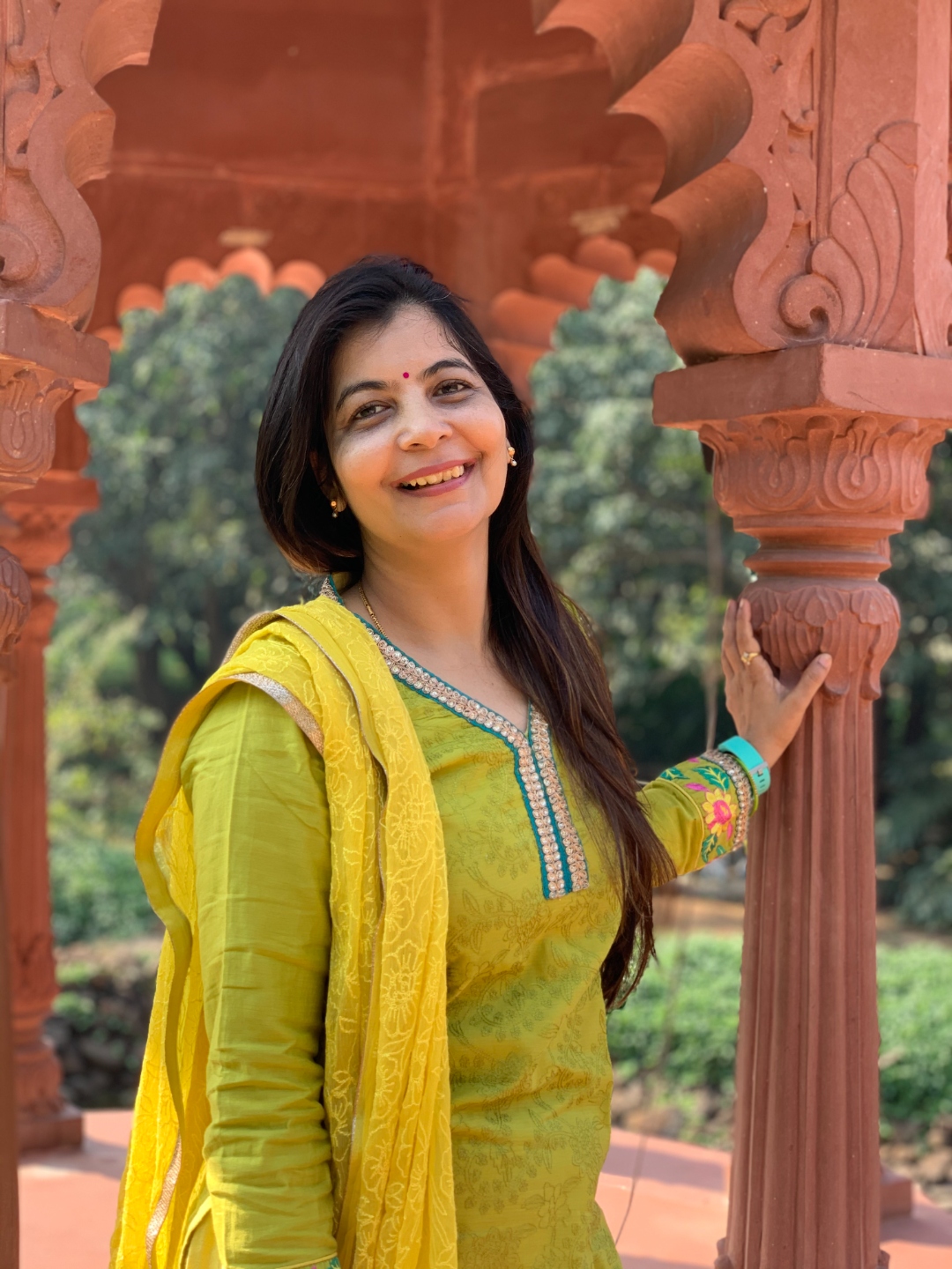Portrait of Kamini Sharma smiling